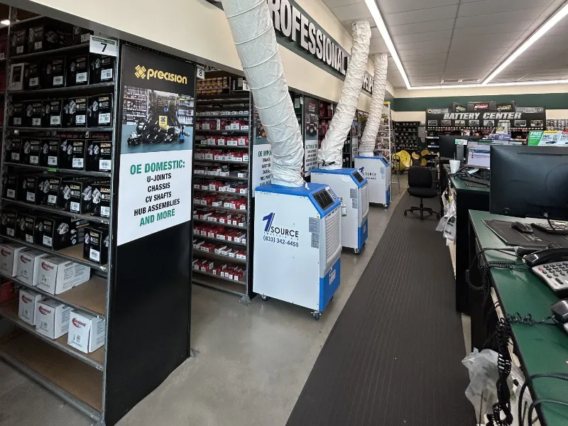 three portable ac units keep the auto parts store cool after a main ac system failure